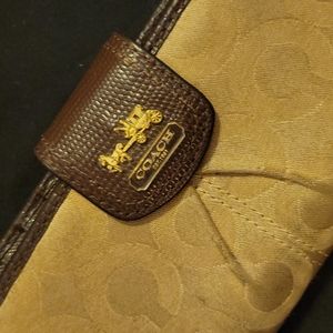 Brown and beige Coach wallet